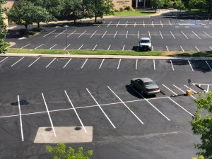 A mostly empty parking lot.